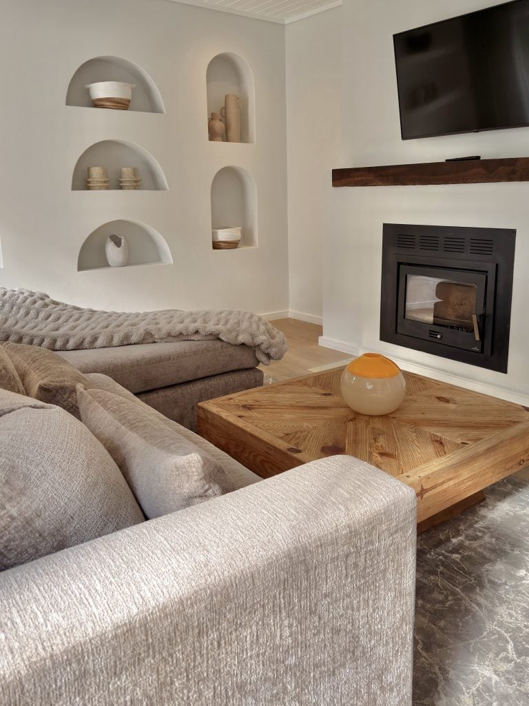 Interior Lounge area with lush furniture and fireplace
