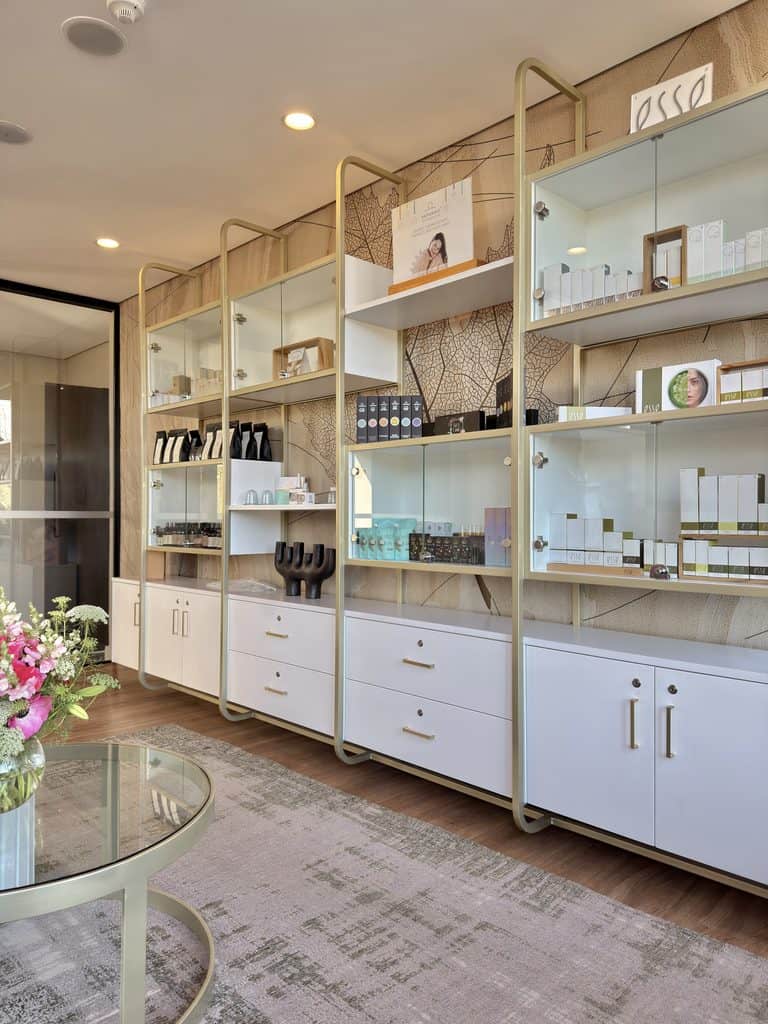 Modern retail display shelves with skincare and beauty products at Hazendal Wine Estate.