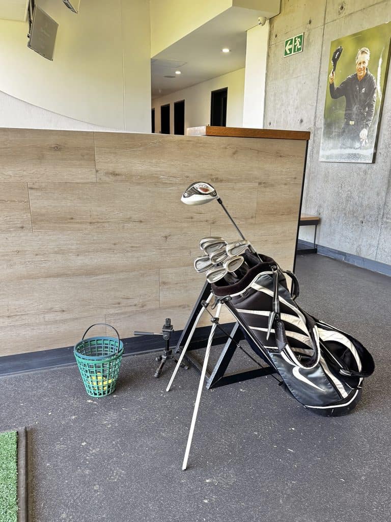 Golf clubs and bag inside Hazendal Wine Estate, Stellenbosch, South Africa.
