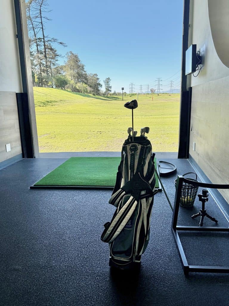 Golf clubs at a golf range