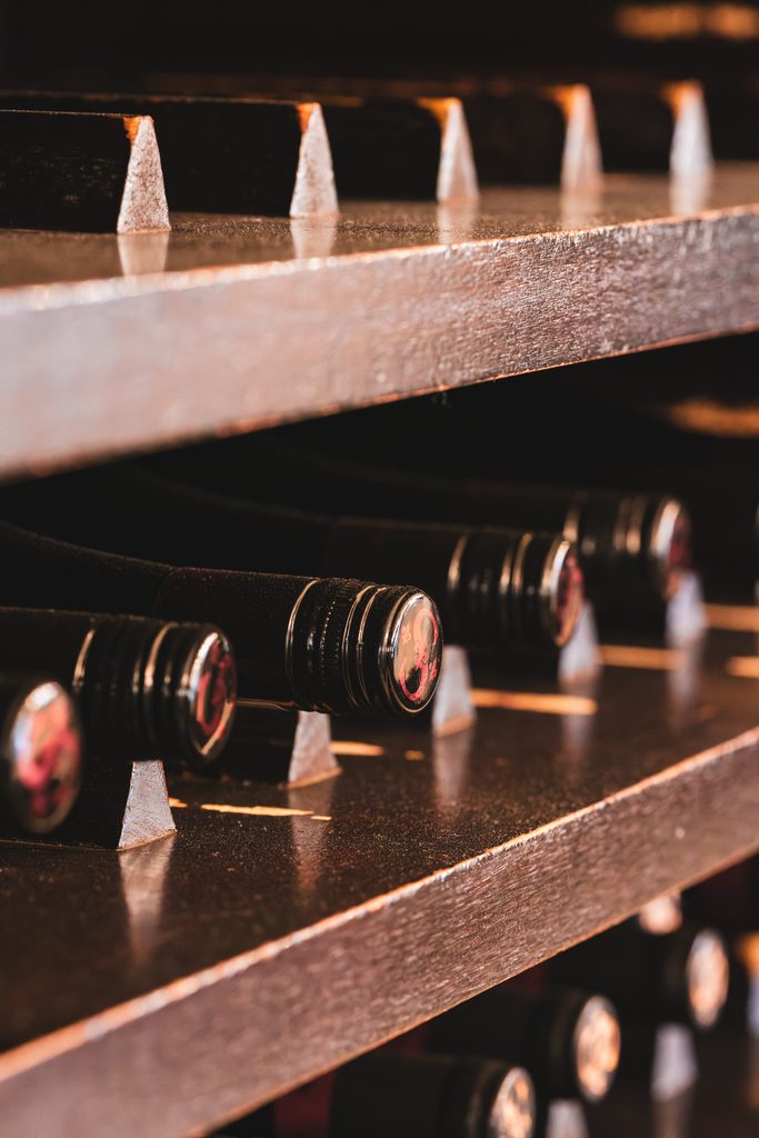 Display of wine bottles on shelf